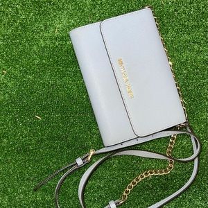 Light blue Micheal Kors crossbody wallet
